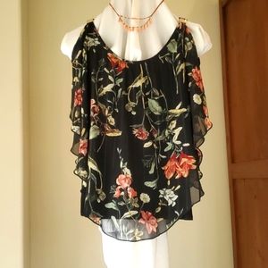 Flirty, floaty, sheer top over solid lining.